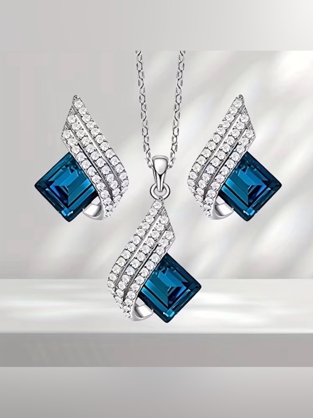 Blue Crystal Pendant and Earring Set in Silver Tone